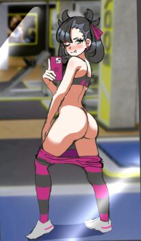 1girl ass black_hair butt_crack gluteal_fold leggings looking_at_viewer looking_back marnie_(pokemon) mirror mirror_selfie nintendo one_eye_closed phone pokemon pokemon_swsh selfie solo tongue tongue_out twintails wink