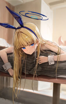 1girl absurdres animal_ears bare_shoulders barefoot bed blonde_hair blue_archive blue_eyes commentary feet halo hidulume highres indoors long_hair looking_at_viewer looking_to_the_side lying on_bed rabbit_ears solo toki_(blue_archive) toki_(bunny)_(blue_archive) white_wrist_cuffs wrist_cuffs