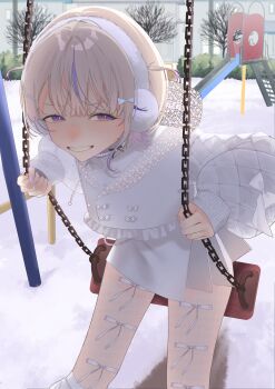 1girl absurdres bayb blonde_hair cold commentary_request earmuffs grin highres hololive hololive_dev_is looking_at_viewer multicolored_hair on_swing outdoors park playground purple_eyes purple_hair short_hair slide smile snow solo streaked_hair swing swing_set todoroki_hajime two_side_up virtual_youtuber