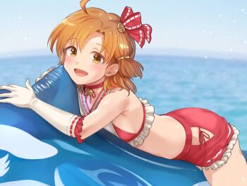 1girl bikini blush commentary_request concept_maihime_(idolmaster) day elbow_gloves gloves hair_ornament hanamasa_ono highres idolmaster idolmaster_million_live! idolmaster_million_live!_theater_days inflatable_shark inflatable_toy looking_at_viewer lying ocean official_alternate_costume on_stomach open_mouth orange_eyes orange_hair outdoors short_hair side-tie_bikini_bottom smile solo swimsuit white_gloves yabuki_kana