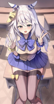 1girl absurdres animal_ears black_thighhighs blue_bow blue_skirt blush bow breasts brown_cardigan brown_eyes cardigan chain_ma cleavage collarbone commentary_request desk double_w ear_covers grey_hair gyaru highres hishi_miracle_(umamusume) horse_ears horse_girl large_breasts long_hair looking_at_viewer on_desk open_mouth pleated_skirt school_desk school_uniform sitting skirt smile solo thighhighs umamusume w yellow_bow