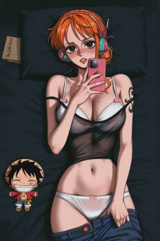 Rule 34 | 1girl, alternate costume, bare arms, bare shoulders, bed sheet, black camisole, blue pants, blush, bra, breasts, brown eyes, bug, butterfly, camisole, character doll, cleavage, clothes pull, collarbone, commentary, cowboy shot, denim, doll, english commentary, eyelashes, grin, hair bun, hat, headphones, highres, holding, holding phone, insect, jeans, large breasts, le petit prince, lips, lipstick mark, looking at viewer, lying, mole, mole on breast, monkey d. luffy, nami (one piece), navel, on back, one piece, orange hair, panties, pants, pants pull, parted lips, phone, pillow, prixmal, red lips, shoulder tattoo, single sidelock, smile, stomach, strap slip, straw hat, stuffed toy, tattoo, underwear, white bra, white panties