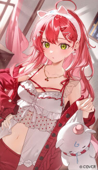 1girl 35p_(sakura_miko) absurdres ahoge animal_ear_hairband animal_ears babydoll breasts buttons cardigan cat_ear_hairband cat_earrings cat_ears clothes_down collarbone commentary_request company_name copyright_notice earrings fake_animal_ears fingernails frilled_babydoll green_eyes hair_between_eyes hair_ornament hairband hairclip hairpin hand_on_own_hip head_bump highres holding hololive indoors jewelry light_blush long_hair looking_at_viewer medium_breasts navel necklace oeuia official_alternate_costume open_cardigan open_clothes parted_lips pink_hair pink_nails red_cardigan red_shorts sakura_miko sakura_miko_(loungewear) shorts sleepwear solo virtual_youtuber white_babydoll