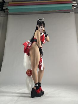 1girl bare_shoulders black_hair cosplay cosplay_photo fatal_fury highres long_hair photo_(medium) platform_sandals ponytail purin_cosplay real_life sandals shiranui_mai shiranui_mai_(cosplay) sleeveless snk street_fighter street_fighter_6 the_king_of_fighters thick_thighs thighs