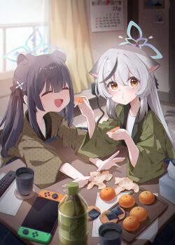 absurdres animal_ear_fluff animal_ears black_hair blue_archive blue_halo blush brown_eyes cocokawa_(cjsj8353) commentary extra_ears food fruit grey_hair halo highres japanese_clothes kimono kokona_(blue_archive) kotatsu long_hair looking_at_viewer mandarin_orange multicolored_hair nintendo_switch open_mouth shun_(blue_archive) streaked_hair symbol-only_commentary table tea tiger_ears tiger_girl tissue_box twintails very_long_hair winter yukata
